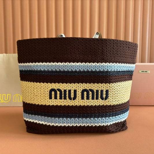 TOTE BAG 40 IN STRIPED PATTERN OF BROWN BLUE AND YELLOW WOVEN RAFFIA